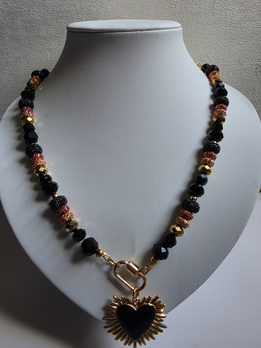 Black and Gold Beaded Necklace with Heart Sunburst Pendant